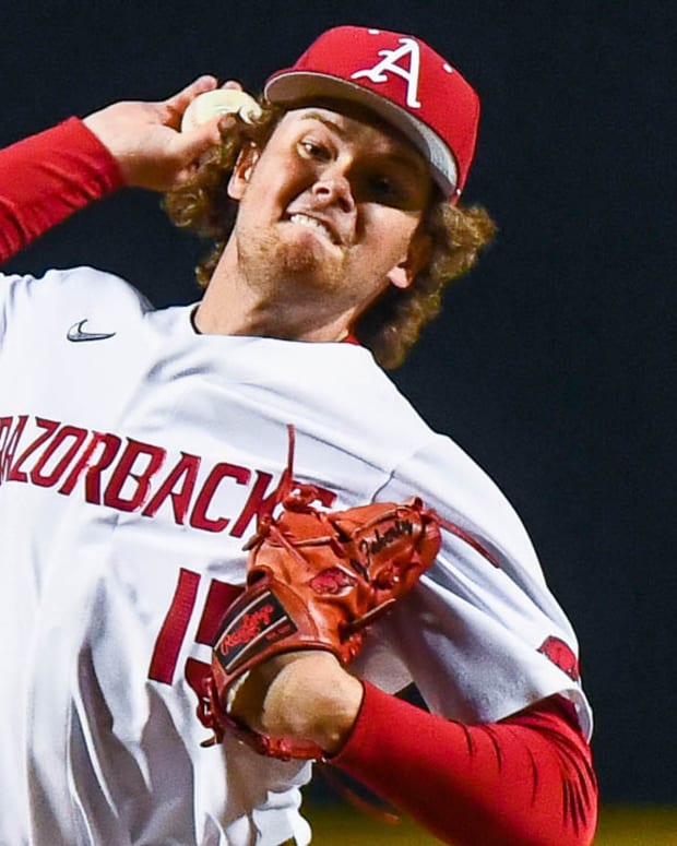 Razorbacks' Ben McLaughlin on mound shutting down Omaha in win Tuesday night.